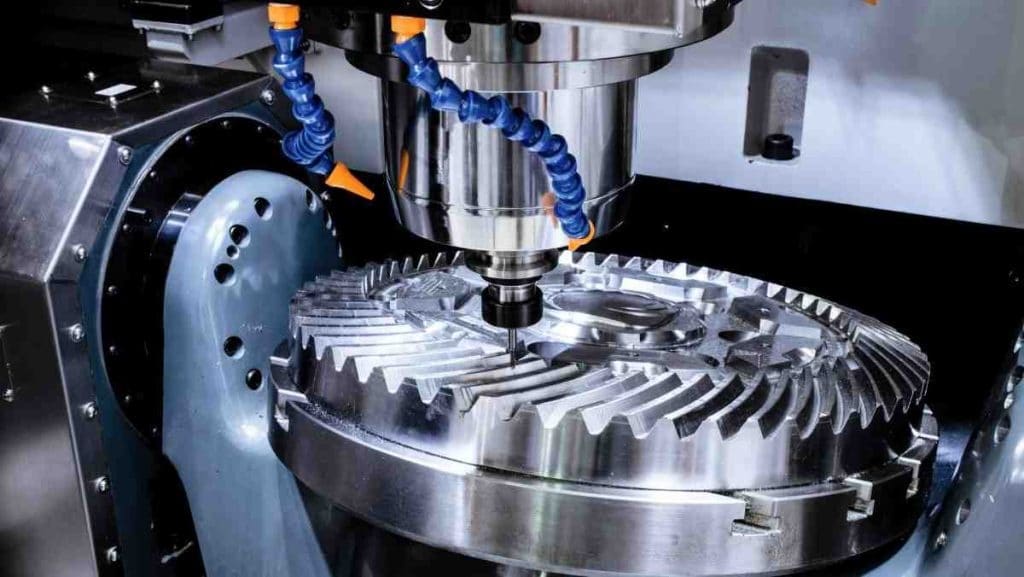 CNC milling machine machining a precision metal component