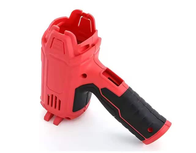 Custom overmolded power tool grips with soft-touch surface for improved handling and anti-slip performance
